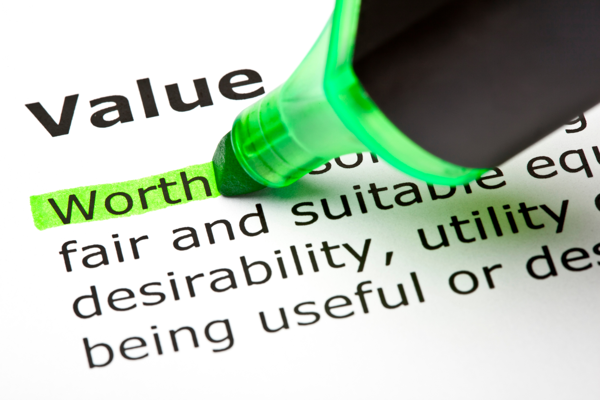 The word value's definition with the word "worth" highlighted in green.
